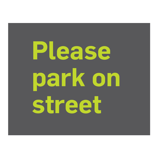 text sign parking on street sign - green